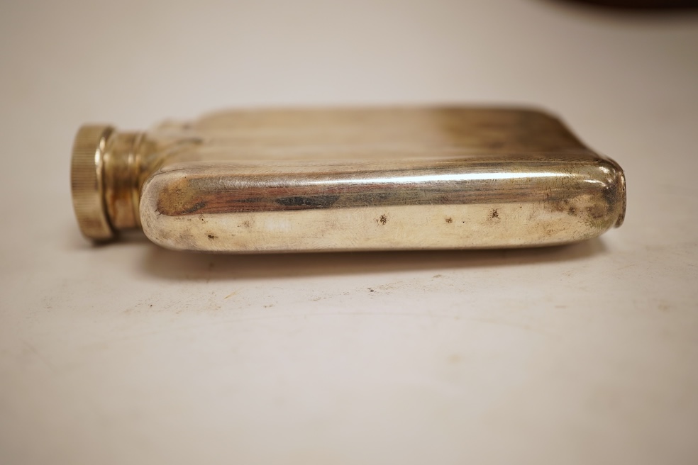 A George V engine turned silver hip flask, William Neale Ltd, Birmingham, 1924, 92mm, 89 grams.